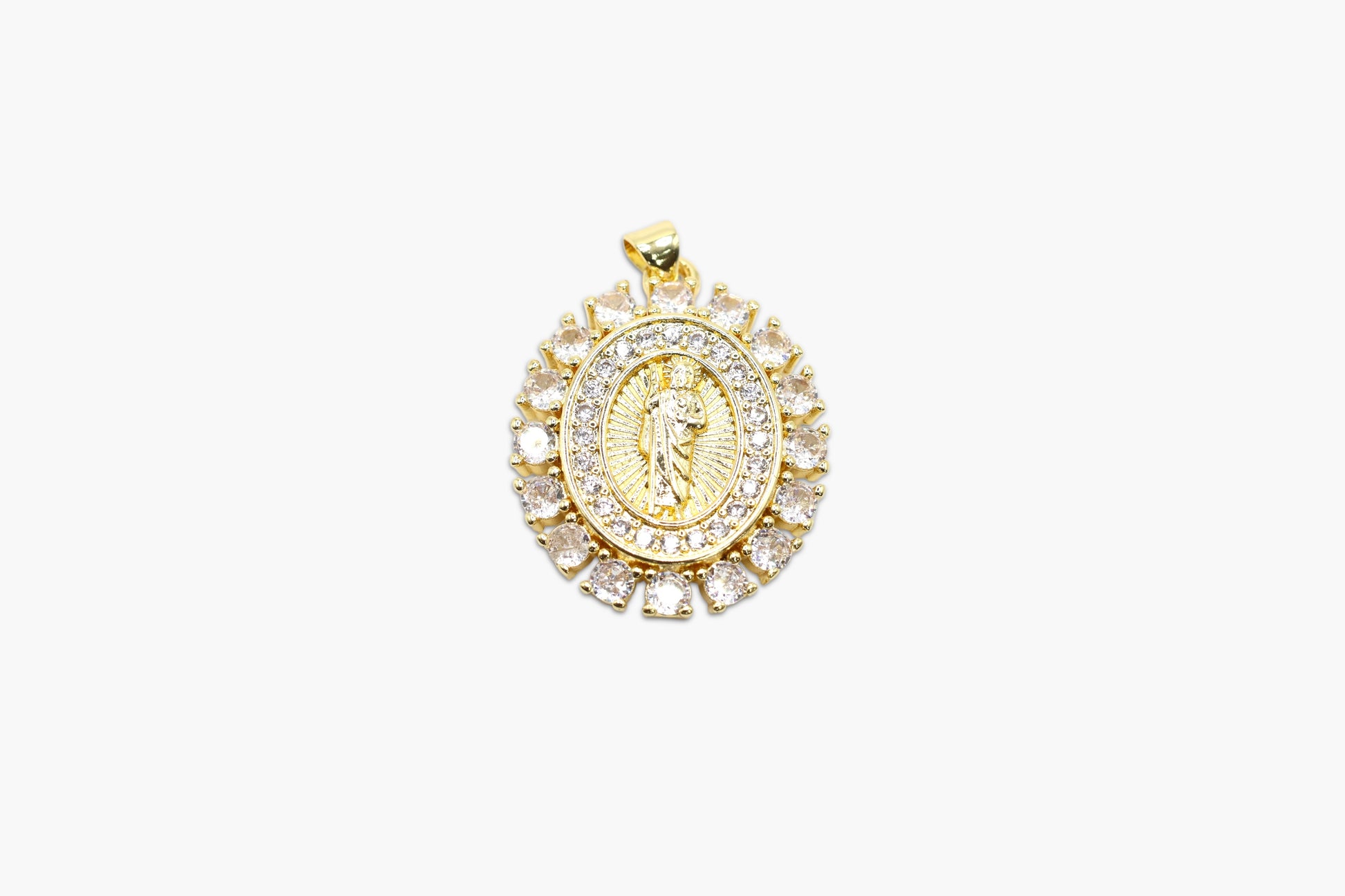 Gold and diamond pendant on a white background