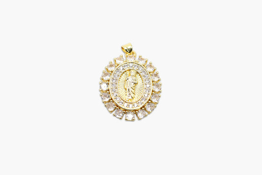 Gold and diamond pendant on a white background