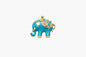 Blue elephant pendant with gold accents on a white background