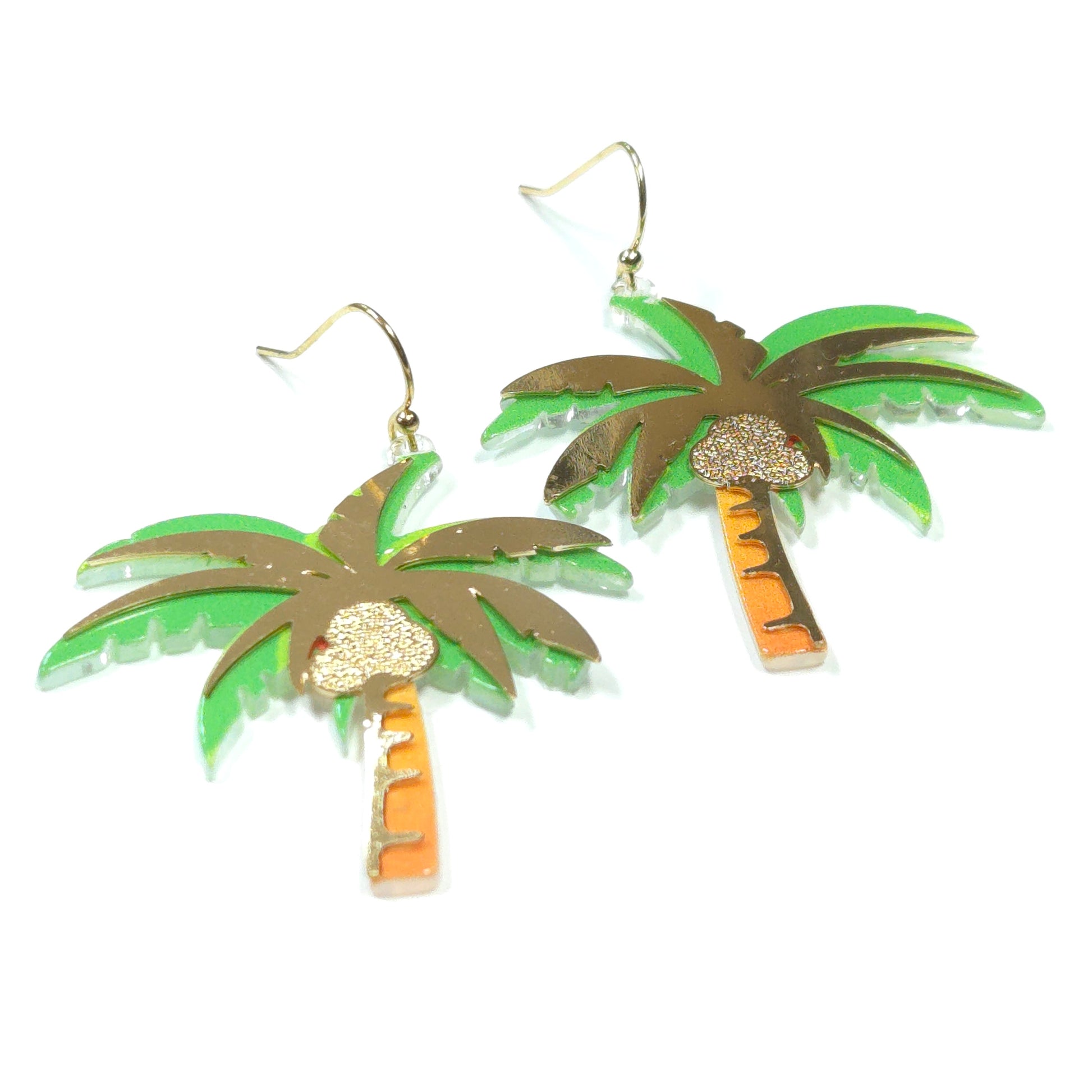 Palm tree-shaped earrings with green leaves and orange accents on a white background