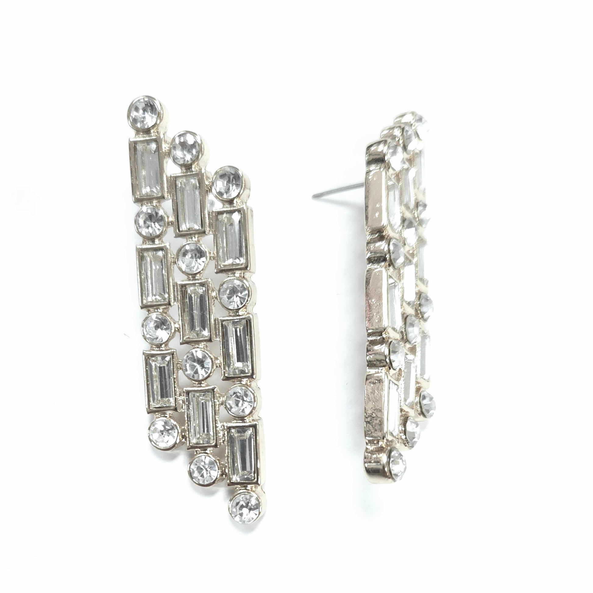 Silver hoop earrings with gemstone-like stones on a white background