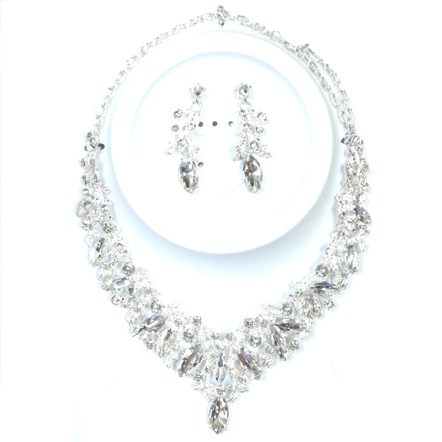 Jewelry set with necklace and earrings on a white background
