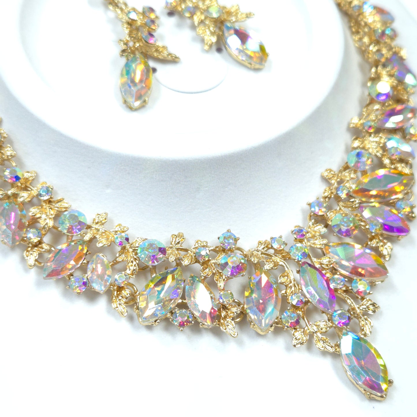 Gold and crystal decorative trim on a white background
