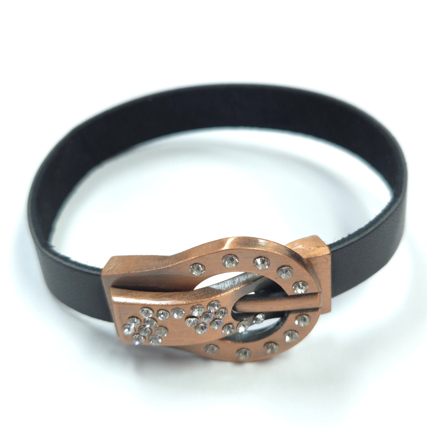 Black belt with a decorative gold buckle featuring crystals on a white background