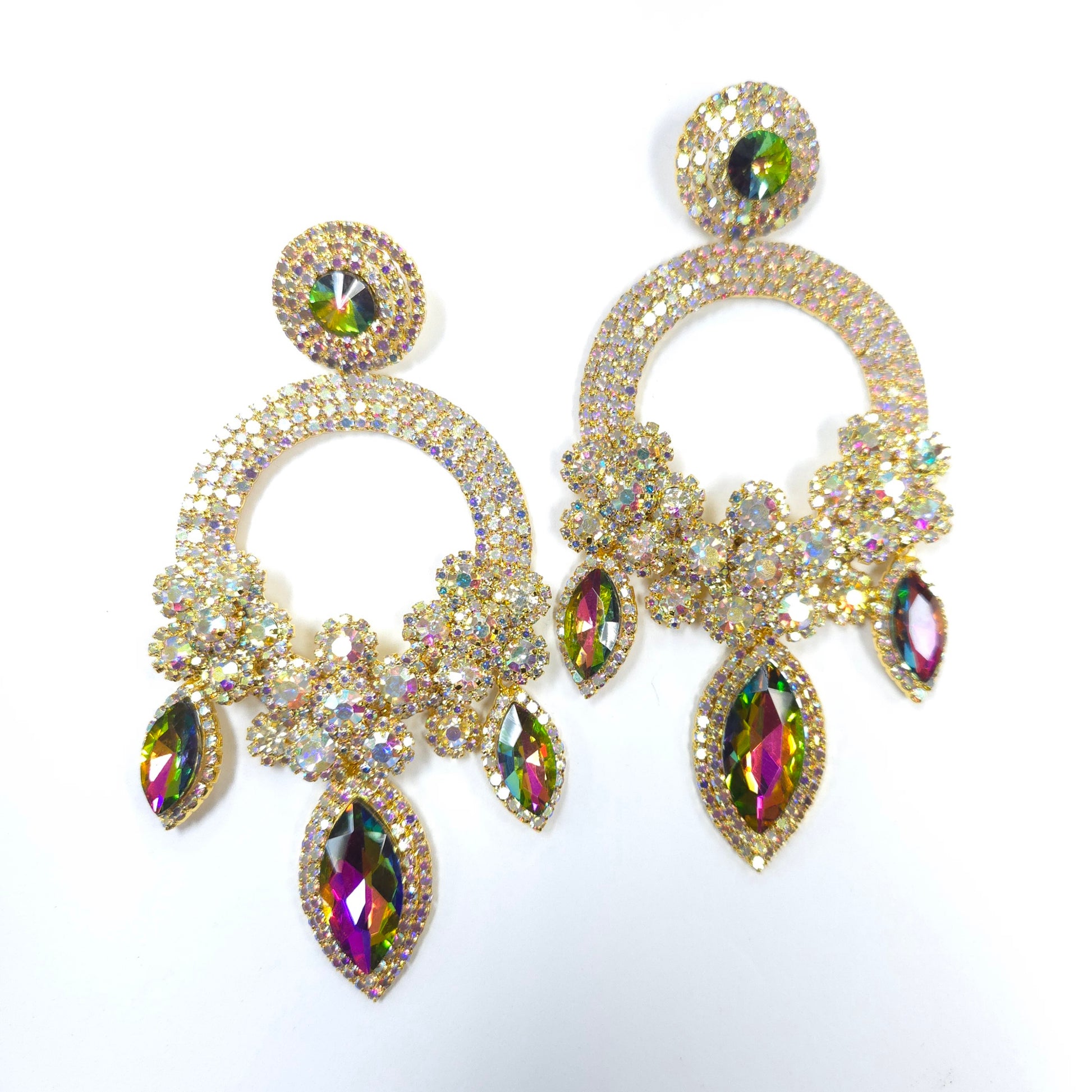 Gold and multicolored gemstone earrings on a white background