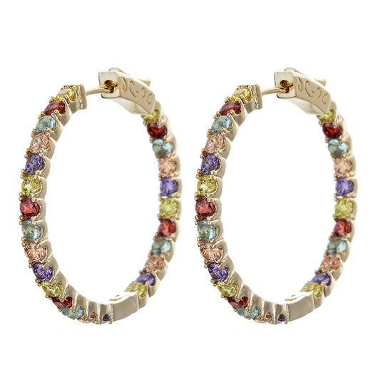 Pair of hoop earrings with multicolored gemstones on a white background