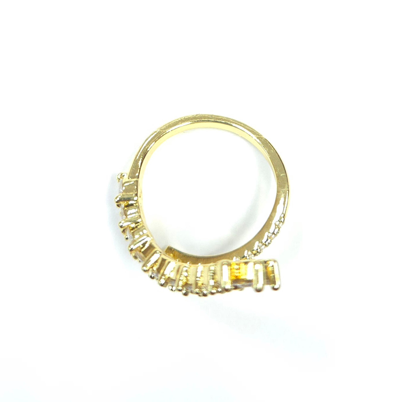 Gold hoop earring with embedded stones on a white background