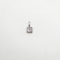 Silver pendant with a square-cut gemstone on a white background