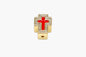 Gold cross charm with a red center on a white background