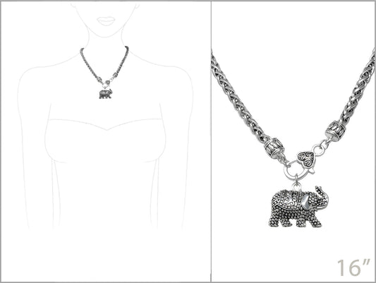 Silver necklace with elephant pendant on a white background