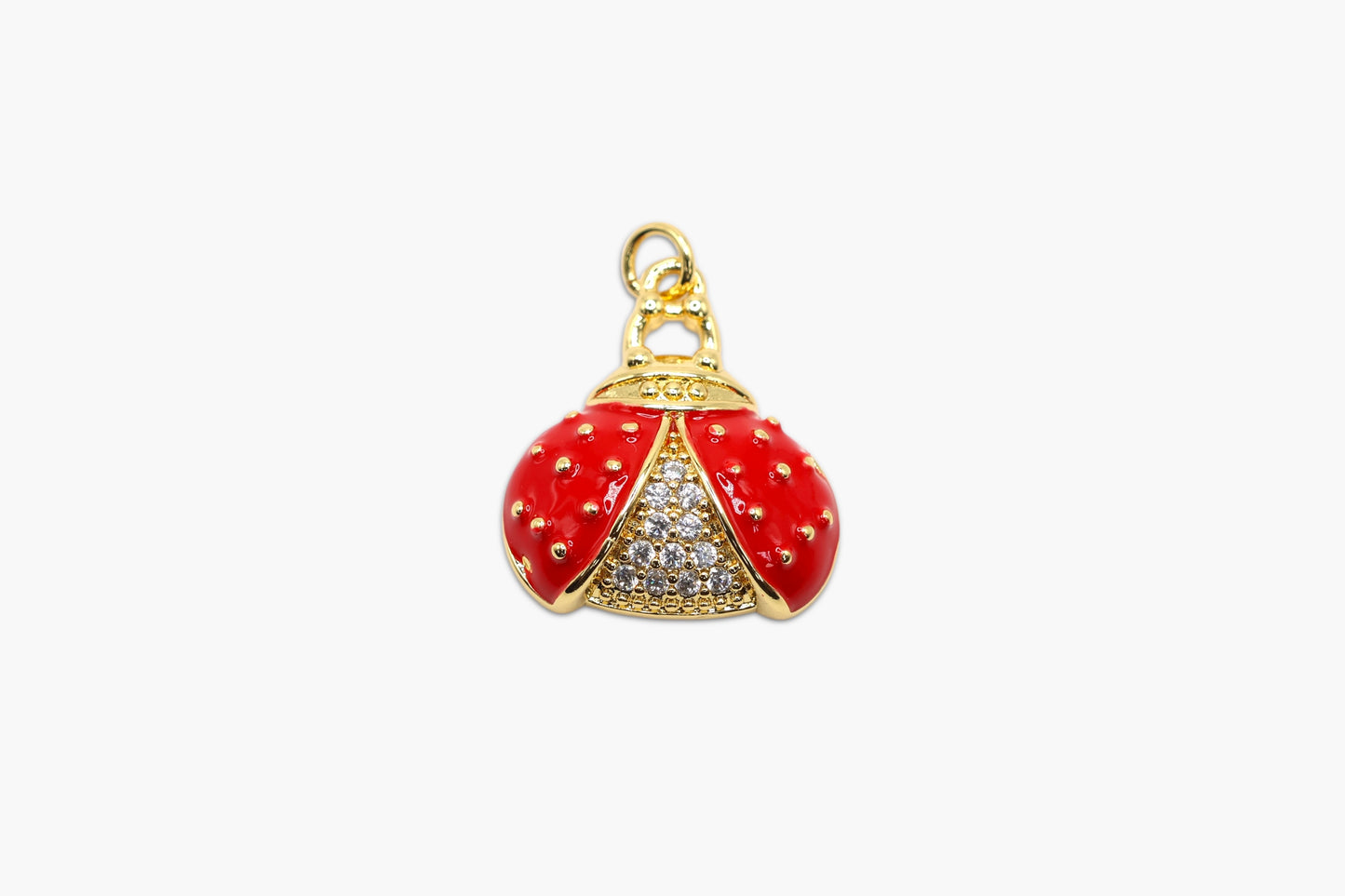 Red pendant with gold accents on a white background