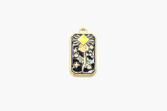 Decorative pendant with floral design on a white background