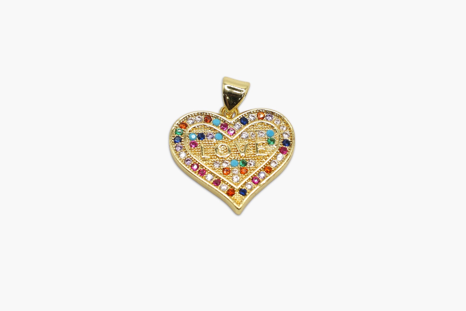 Heart-shaped gold pendant with colorful gemstones on a white background