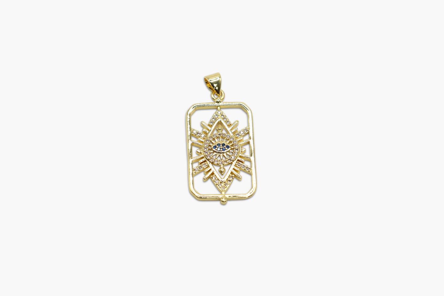 Gold pendant with intricate design on a white background