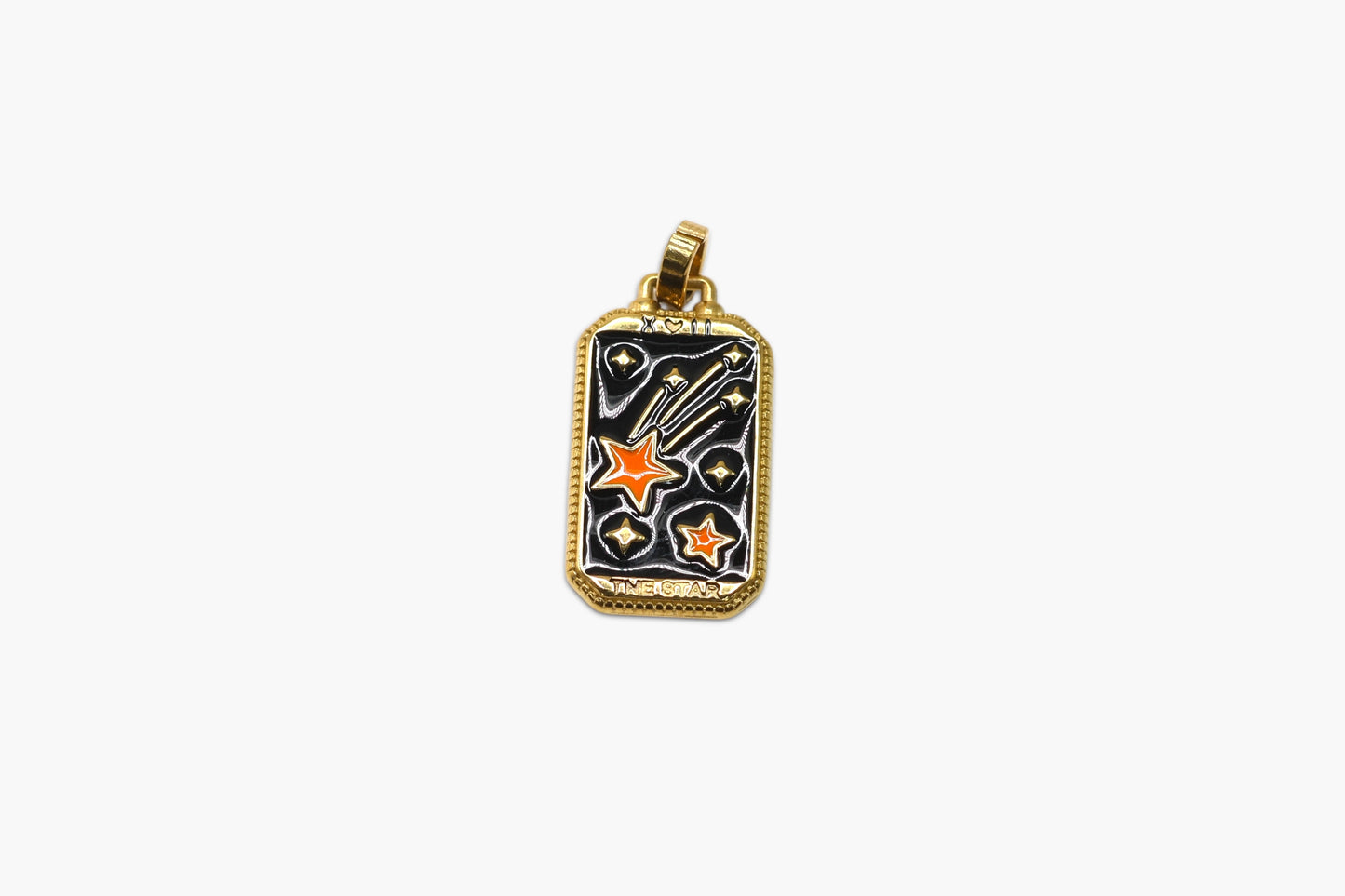 Gold pendant with star designs on a white background