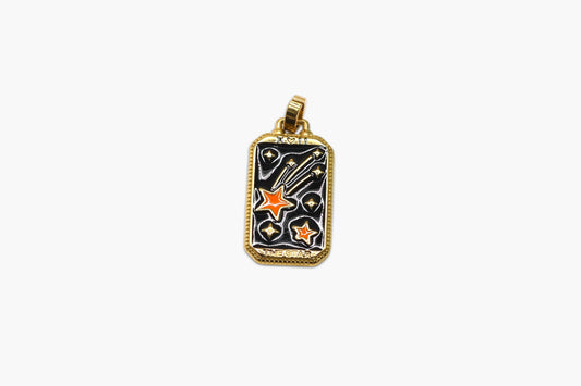 Gold pendant with star designs on a white background