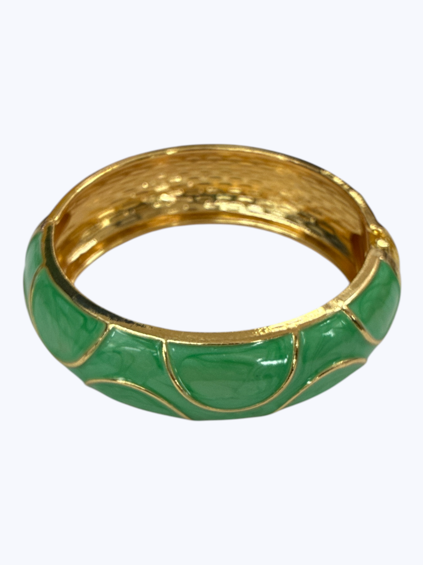 Gold-tone hinged bangle bracelet with glossy Kelly green enamel accents and textured metallic finish for a bold boutique-inspired look.
