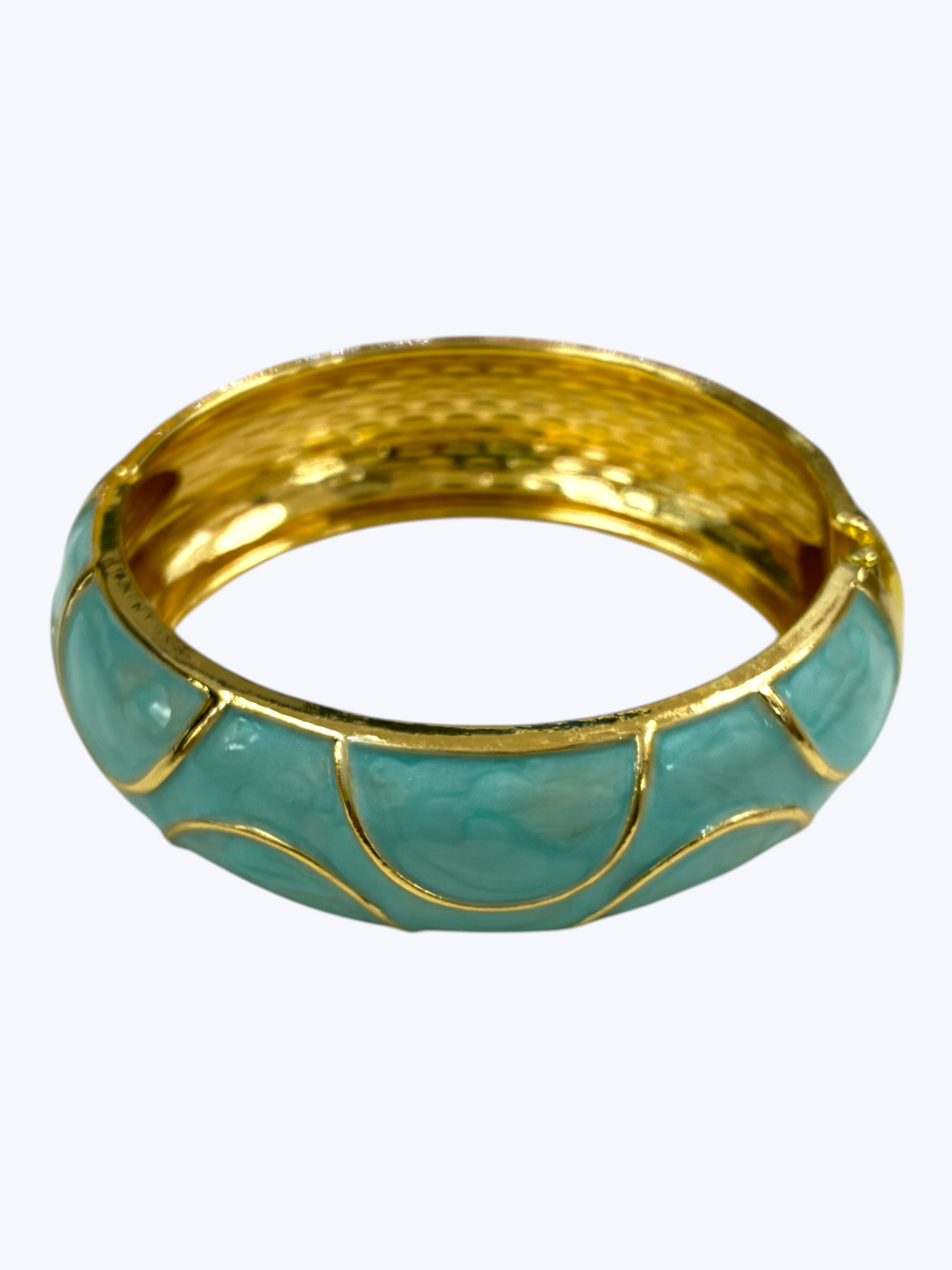 Gold-tone hinged bangle bracelet with glossy light green enamel accents and textured metallic finish for a fresh boutique-inspired look.