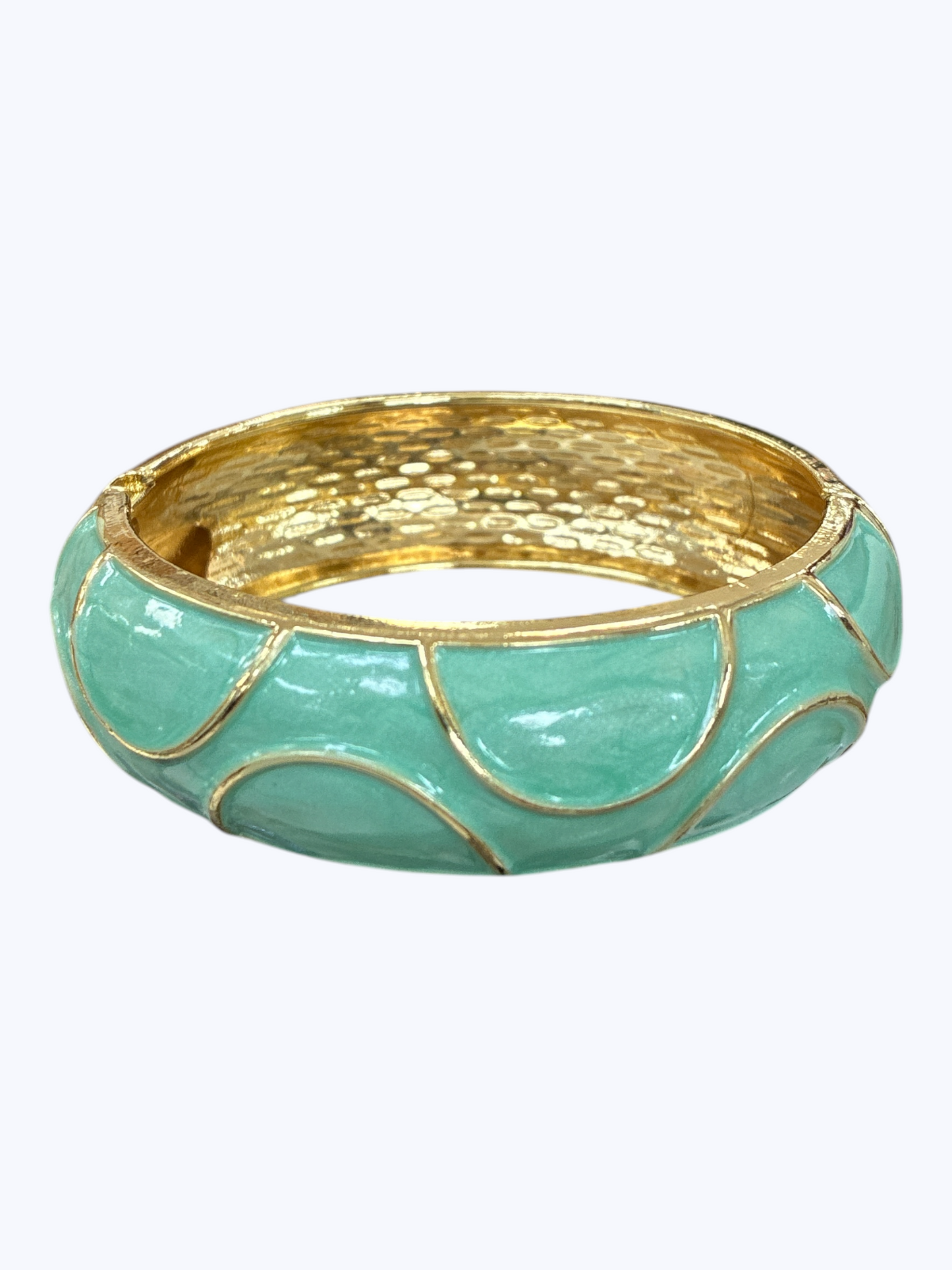 Gold-tone hinged bangle bracelet with glossy aqua enamel accents and textured metallic finish for a fresh boutique-inspired look.