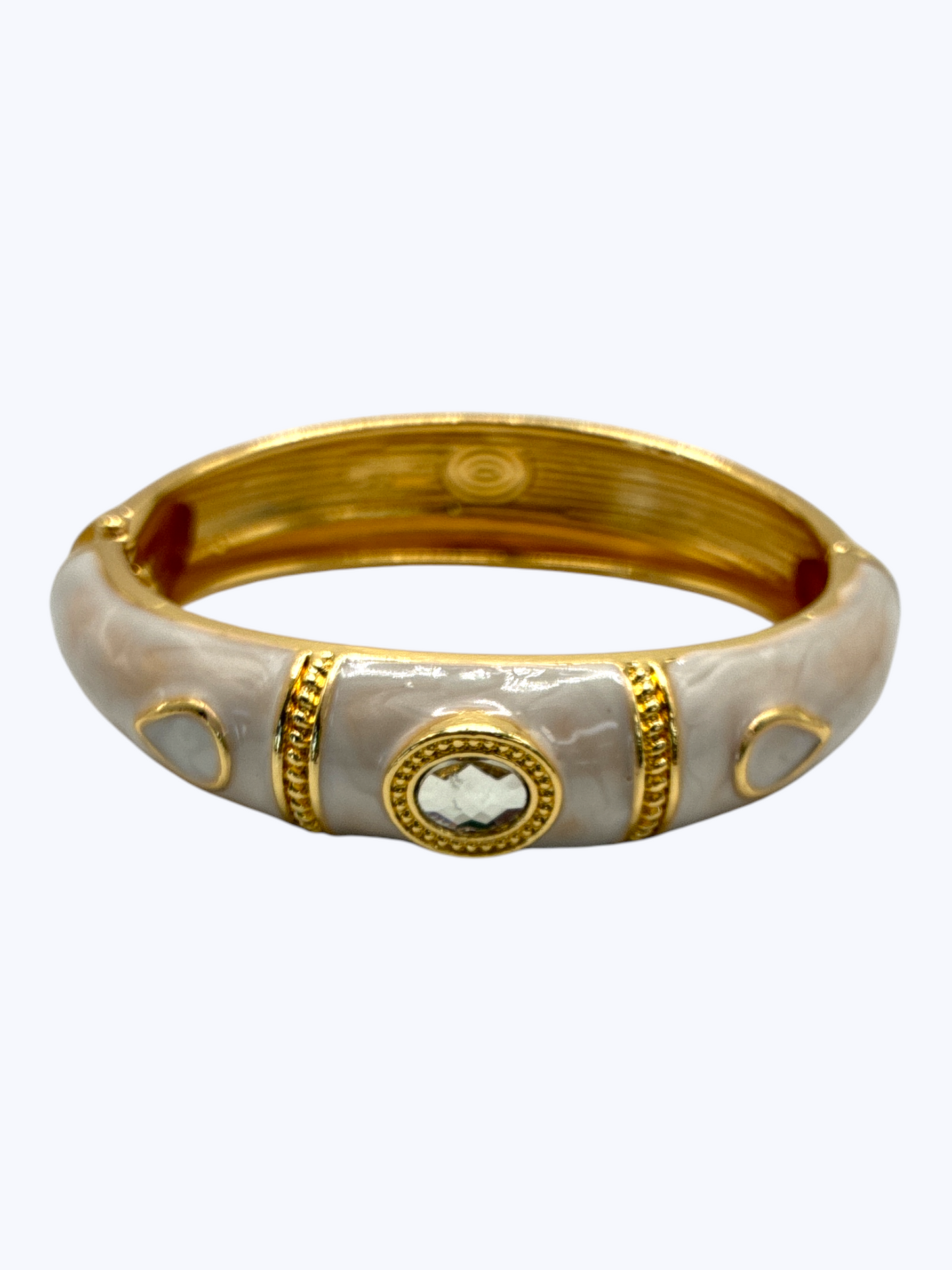 Gold and beige bangle on a white background
