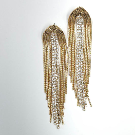 Long gold and silver beaded earrings on a white background