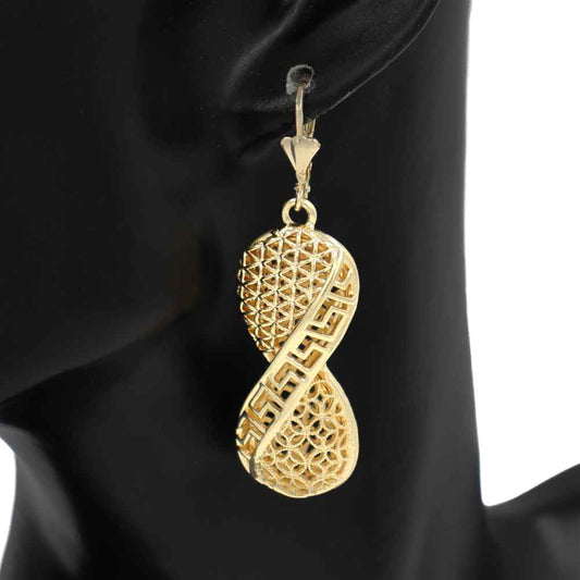 Filigree dangle earrings featuring intricate openwork teardrop elements and decorative geometric detailing.
