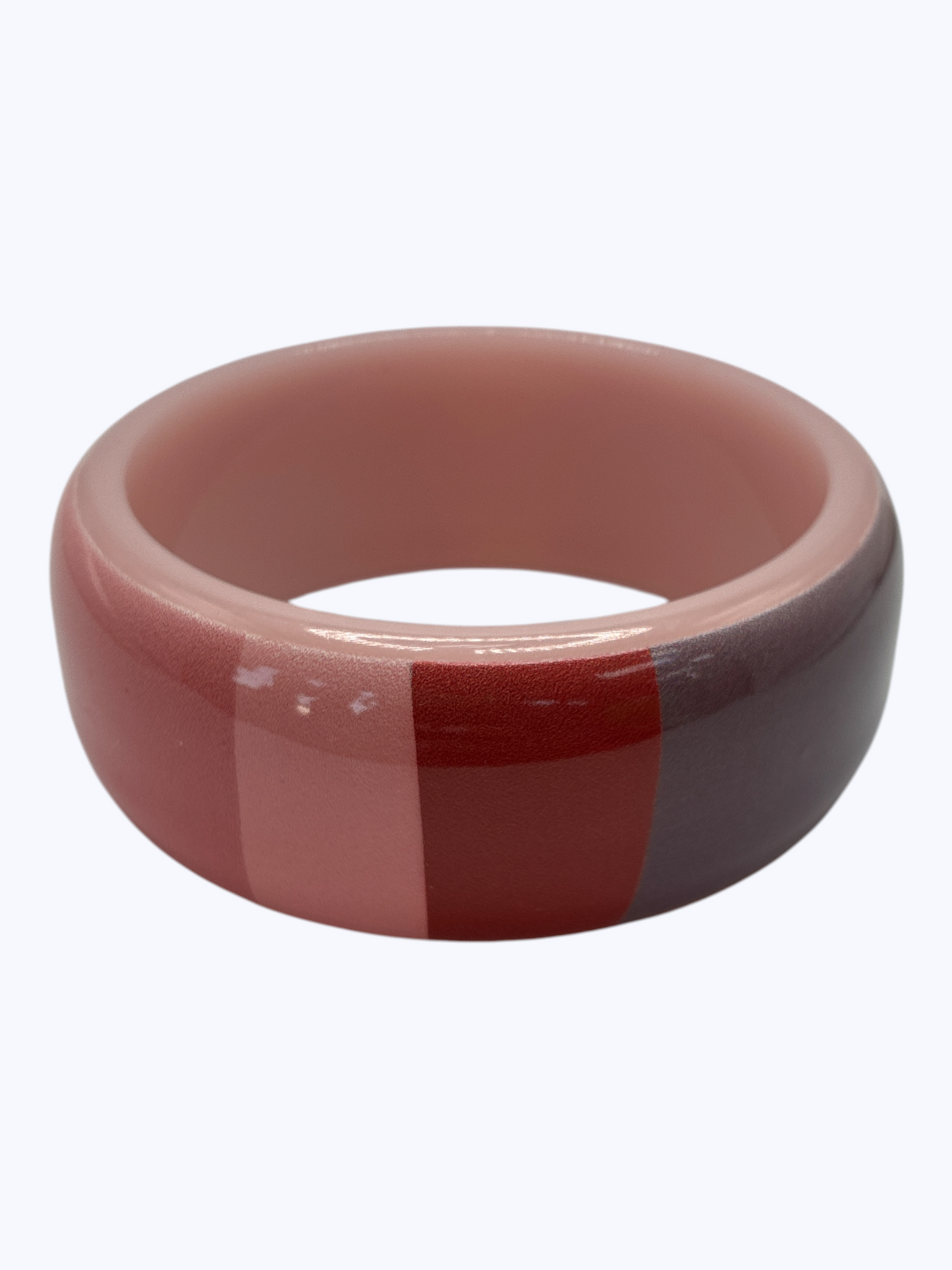 Two-tone pink and red ring on a white background