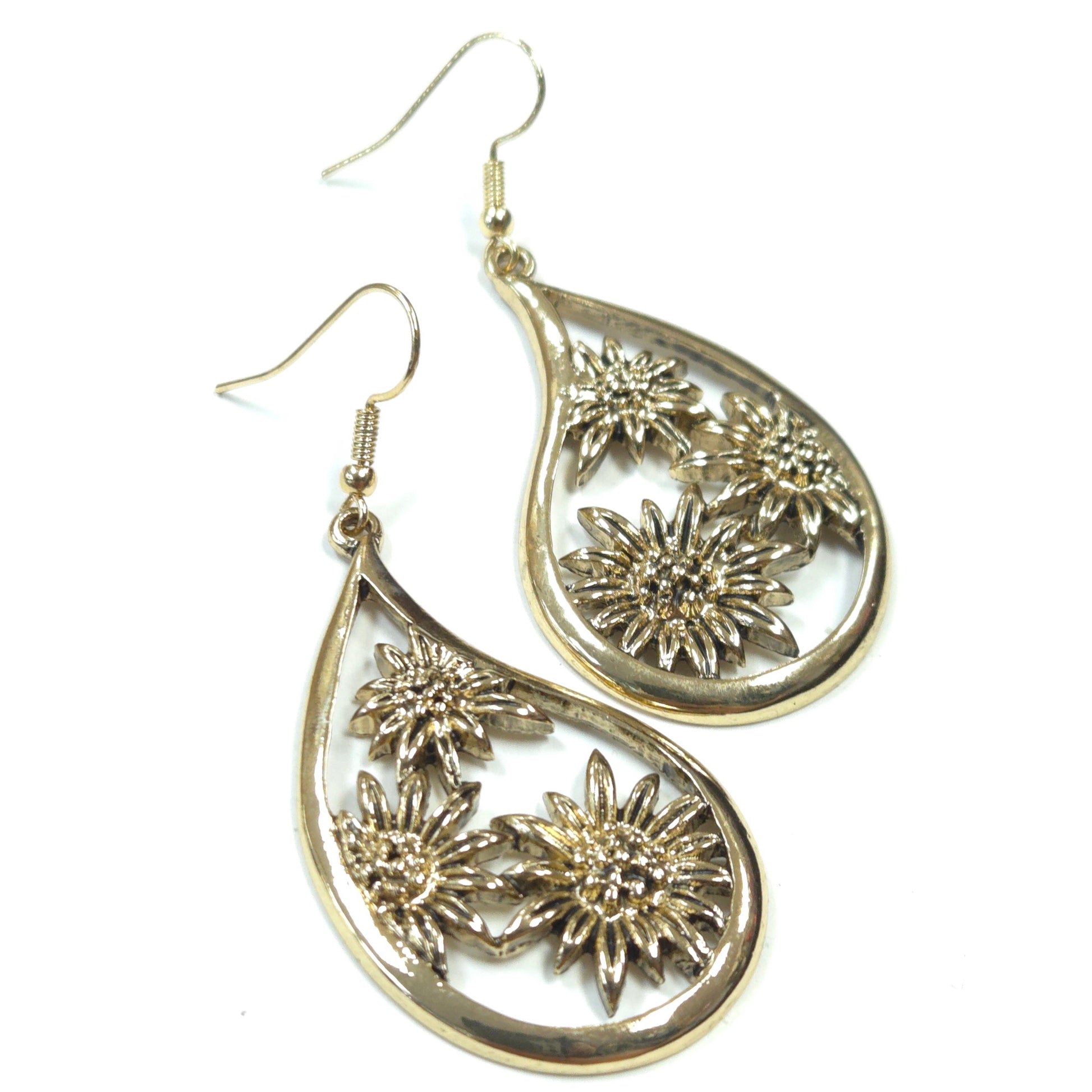 Silver floral teardrop earrings on a white background