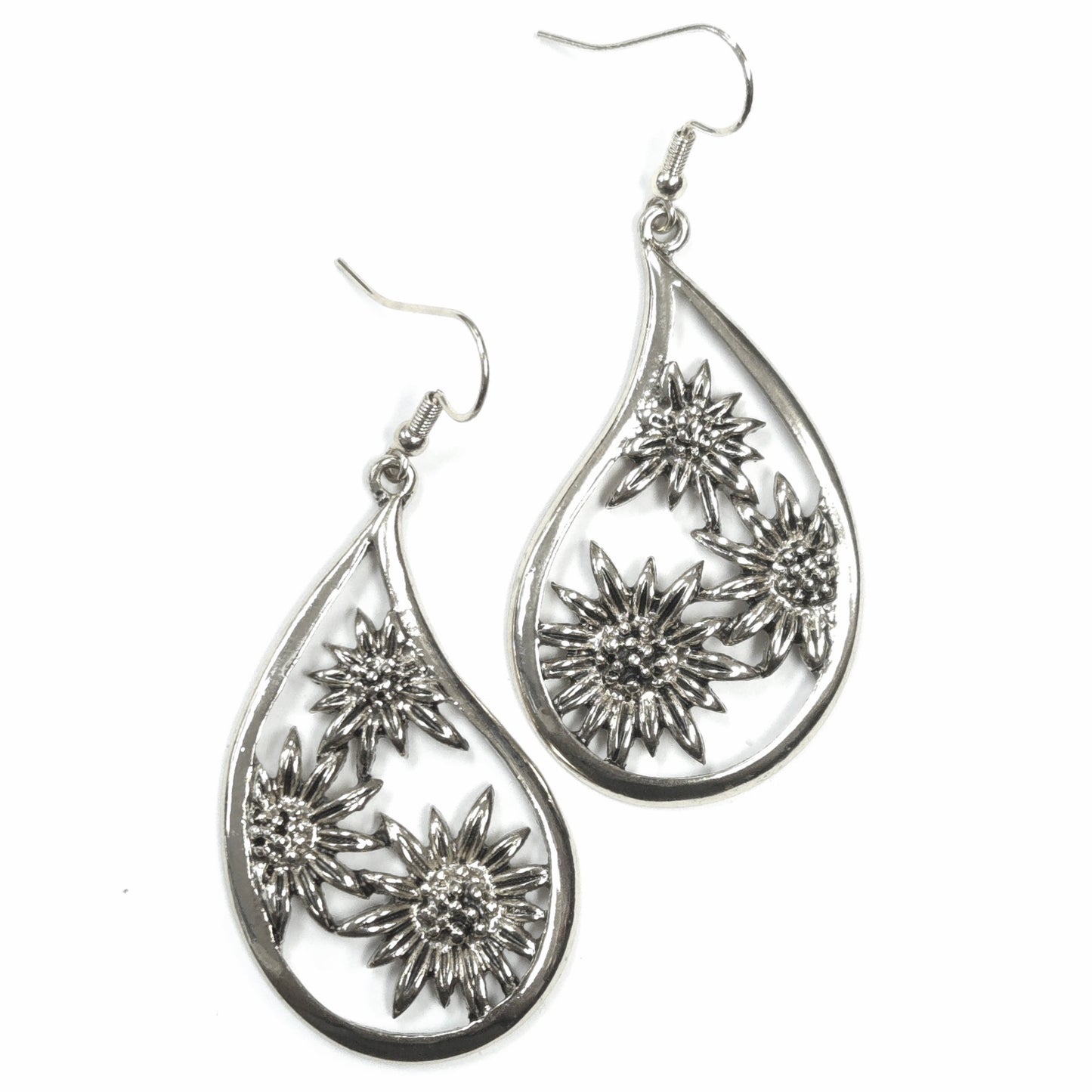 Silver floral teardrop earrings on a white background