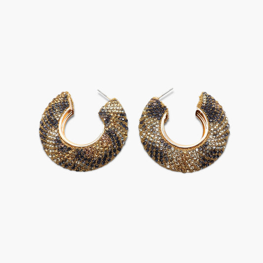 A pair of gold-colored hoop earrings with rhinestone embellishments.