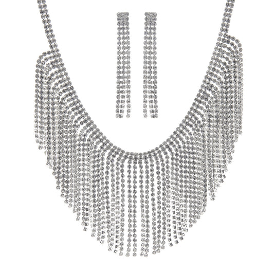 Silver necklace with fringe design on a white background