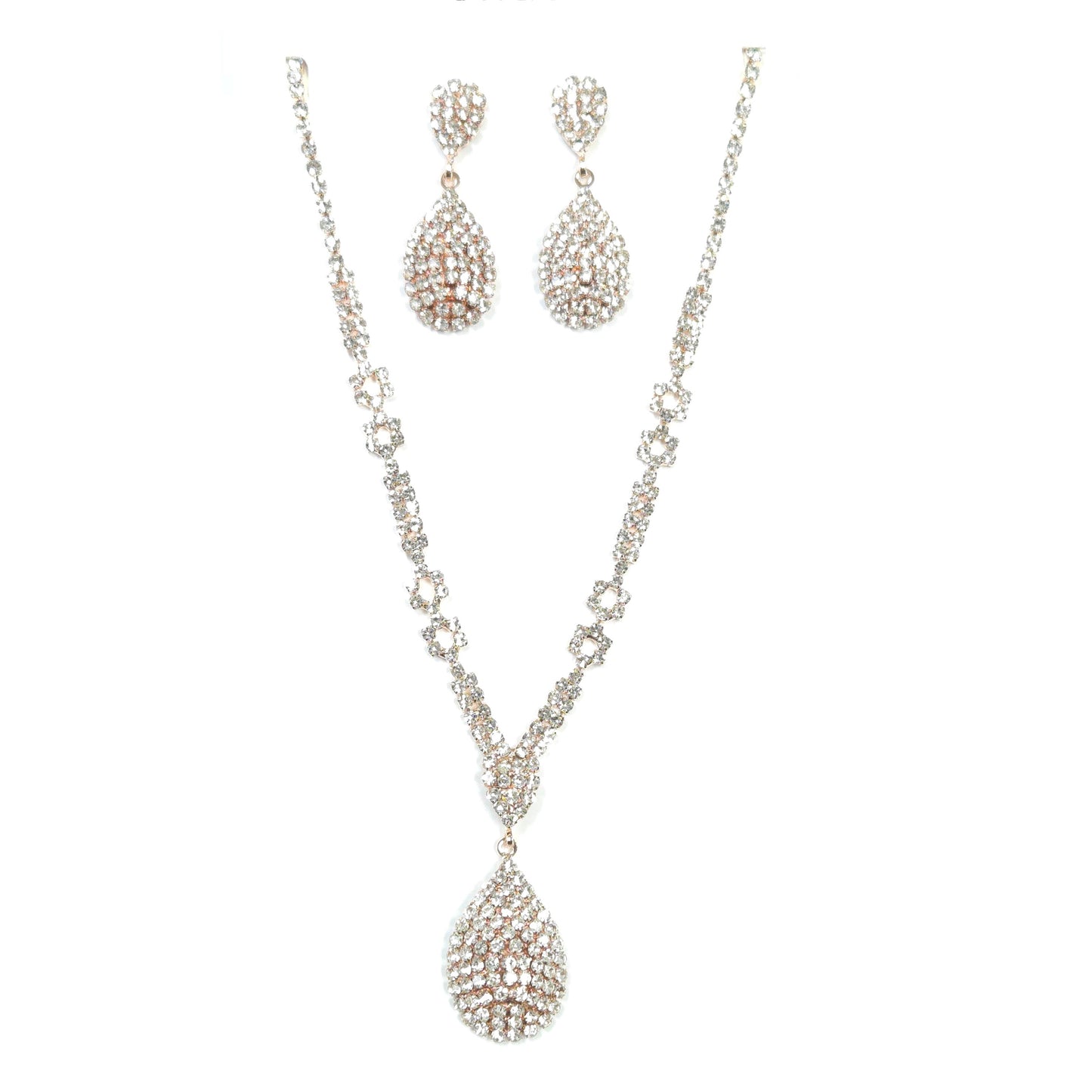 Silver necklace and earrings set on a white background