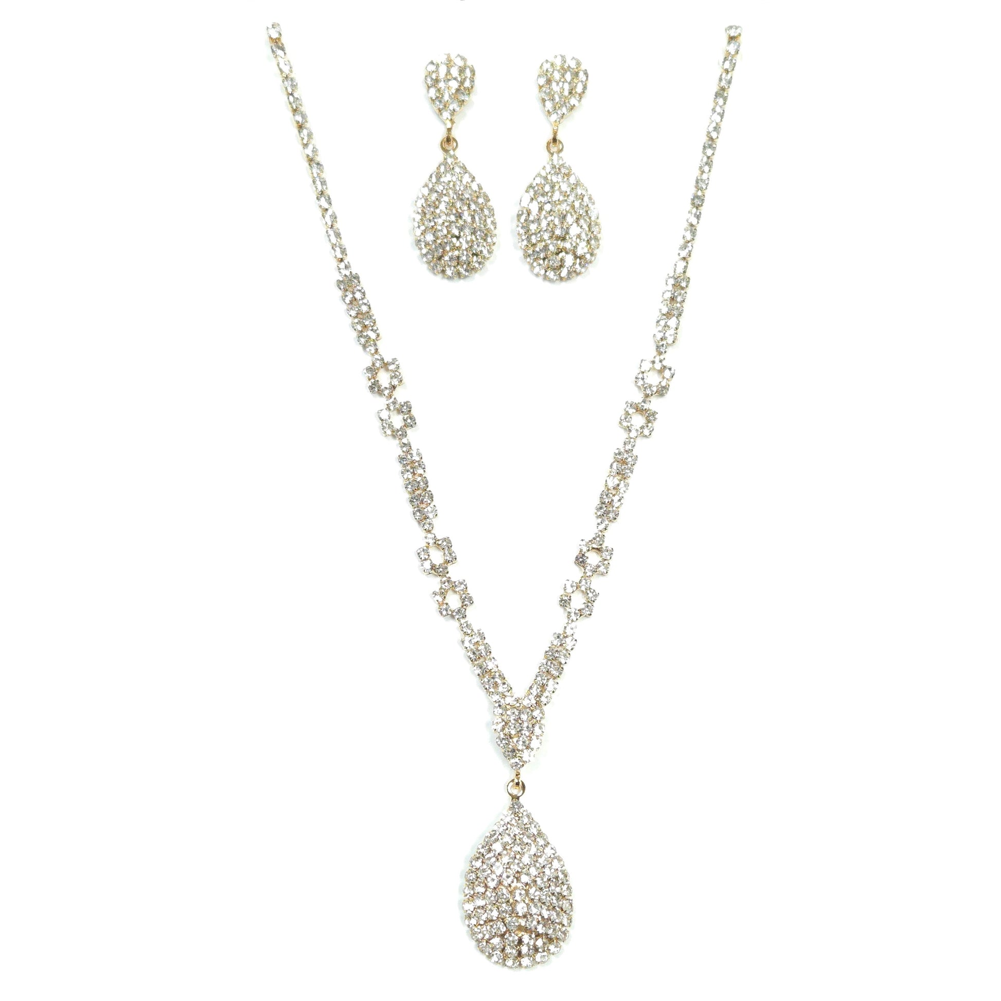 Silver necklace and earrings set on a white background