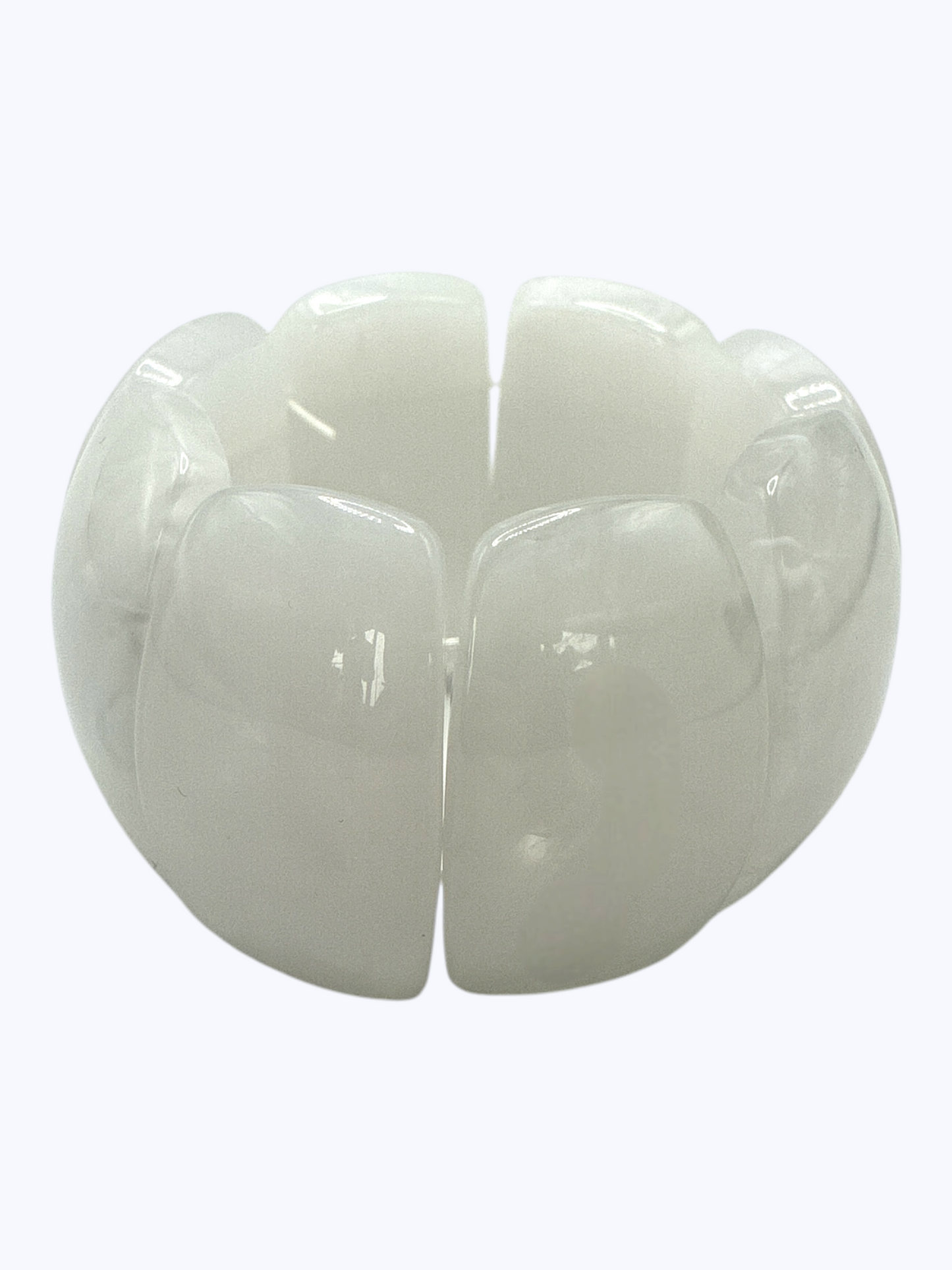Chunky white marbled stretch bracelet with glossy oversized resin links for a chic minimalist boutique-inspired style.