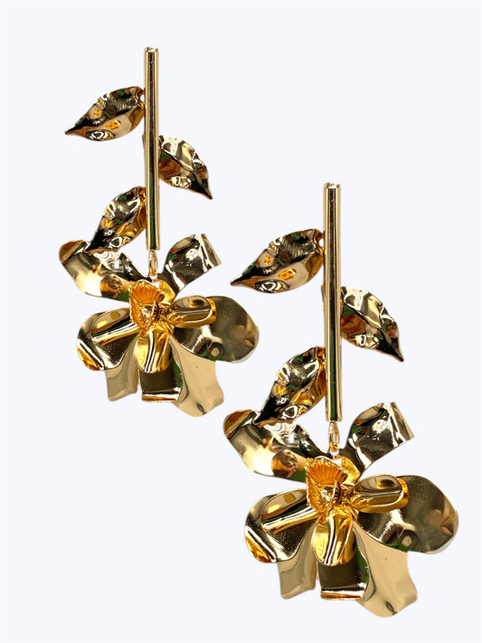 Sculpted floral drop earrings with textured botanical leaves and artistic dangling flower design.