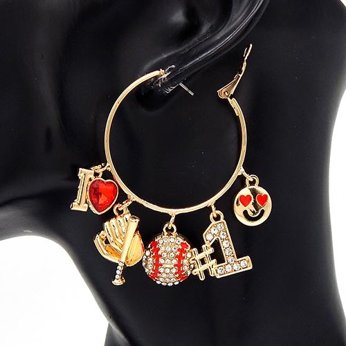 Gold hoop earrings with various charms on a black mannequin.