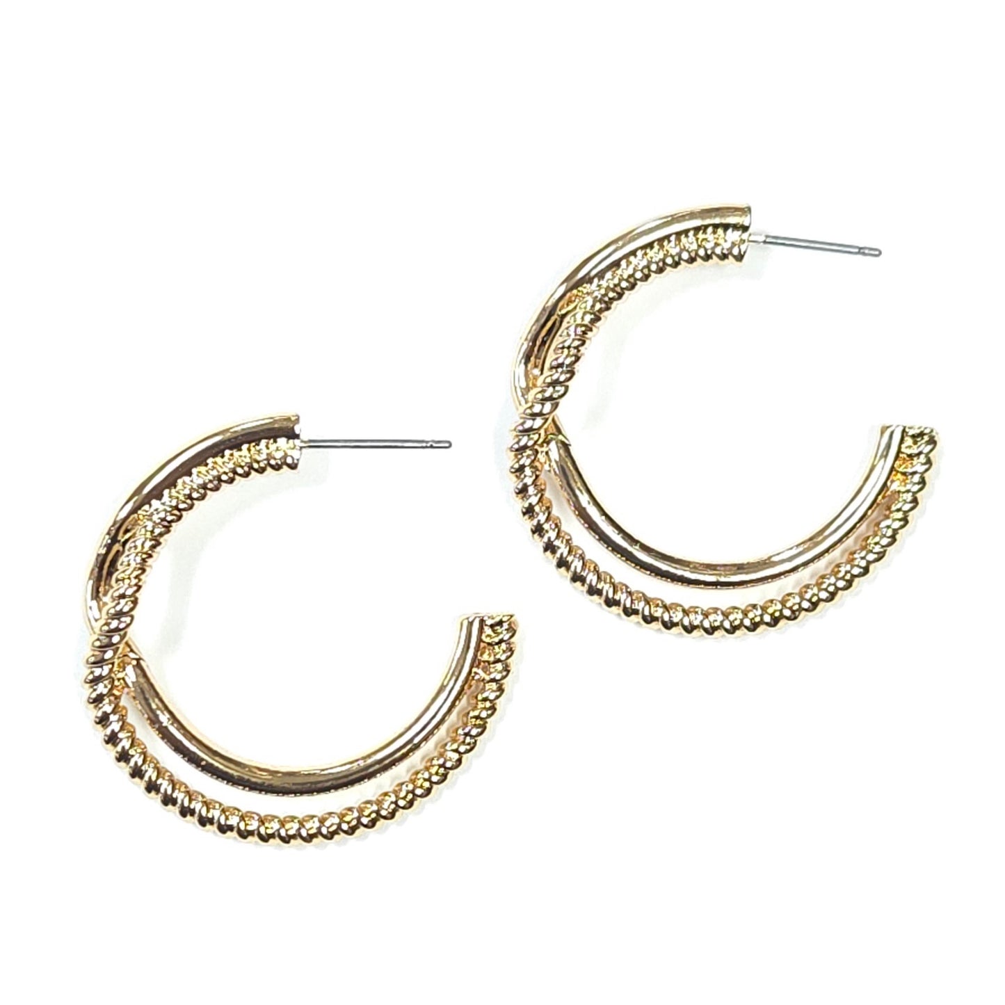 Gold hoop earrings on a white background
