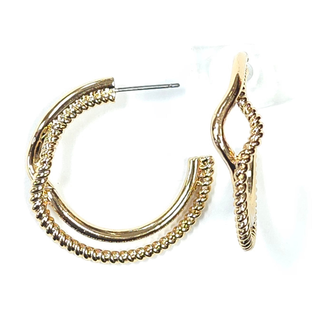 Gold hoop earrings on a white background