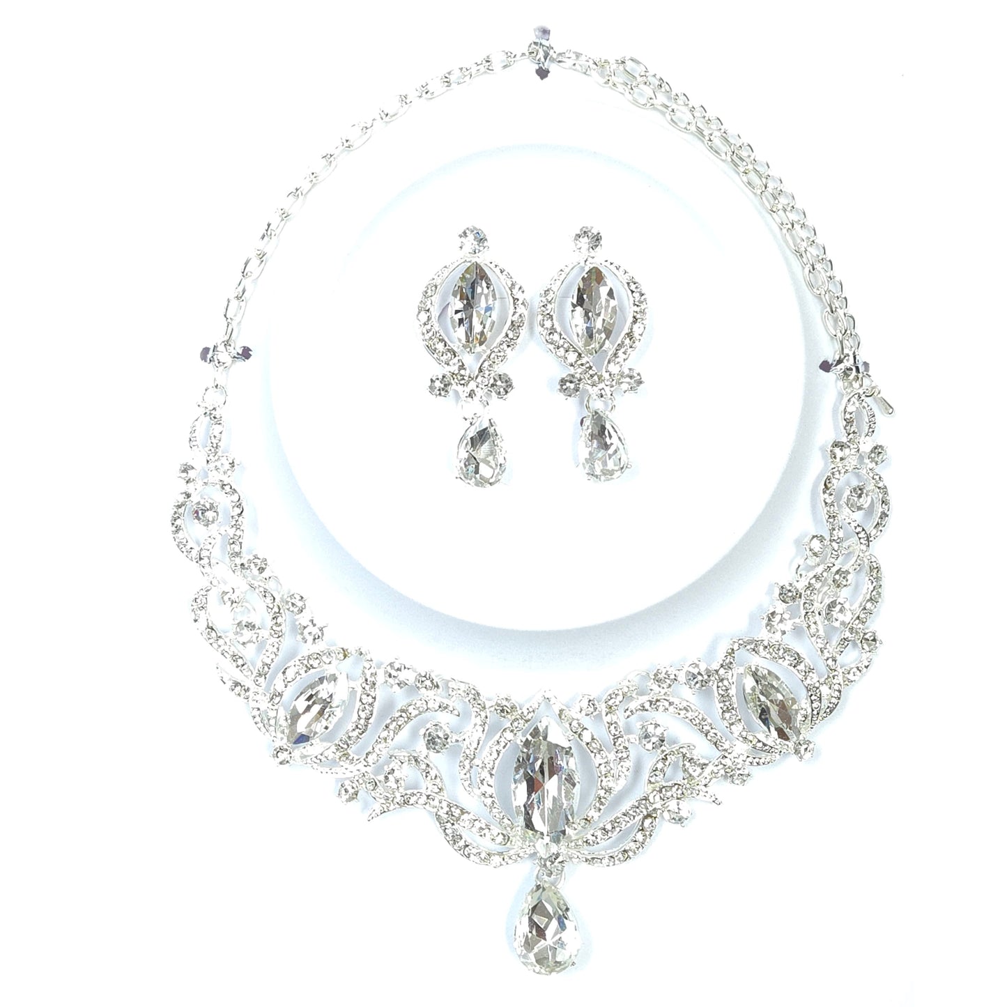 Jewelry set with necklace and earrings on a white background