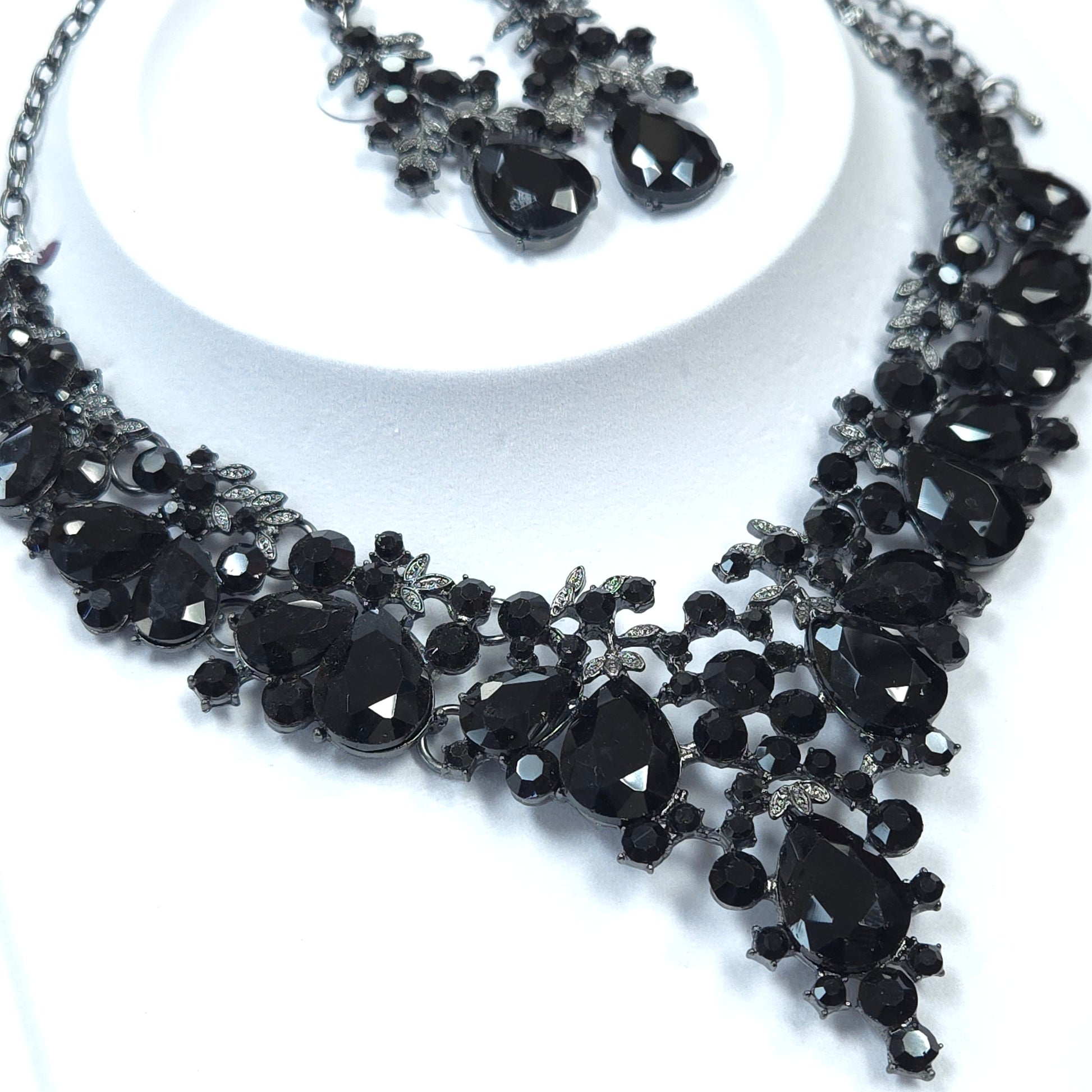 Necklace with black gemstones on a white background