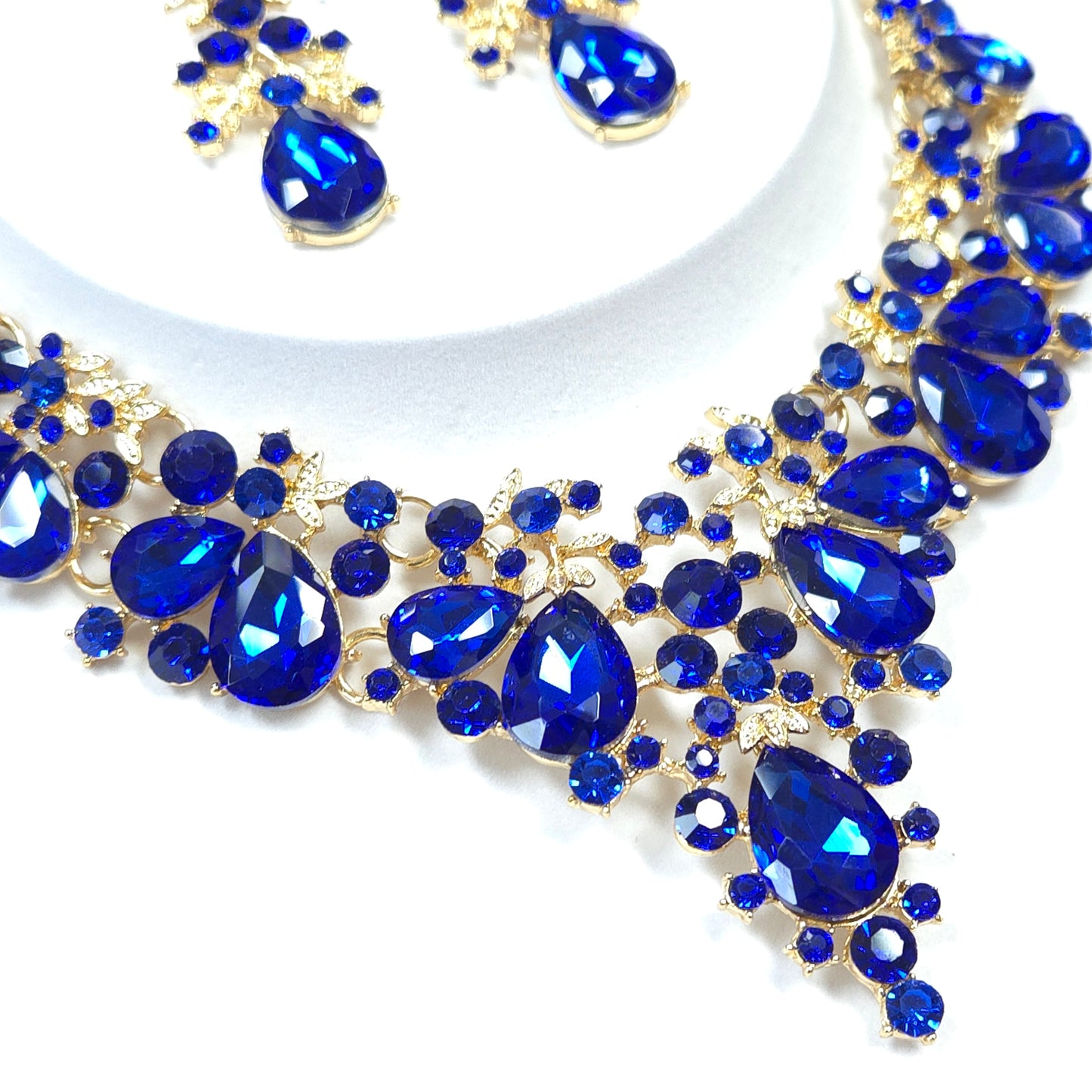 Blue gemstone necklace on a white background