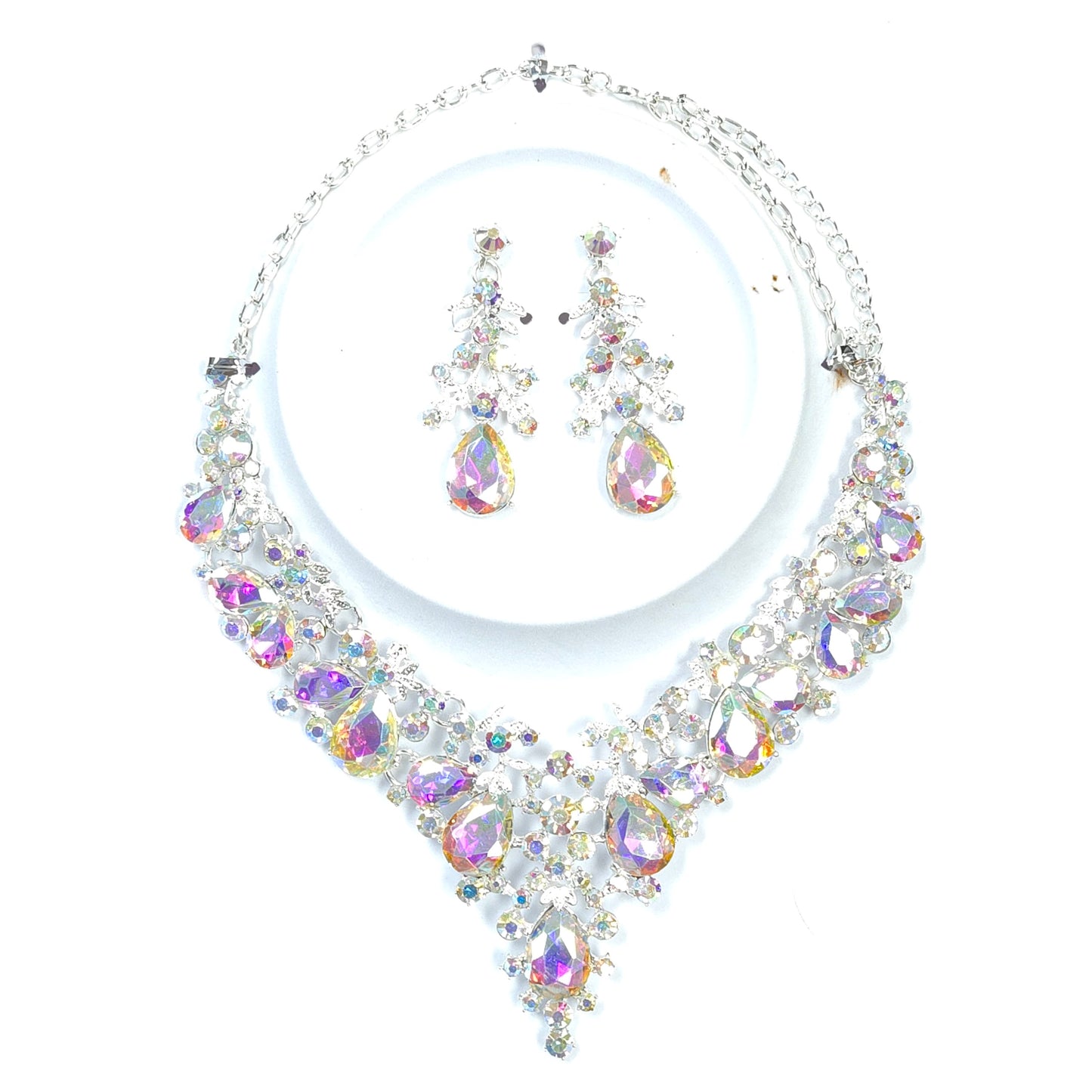 Jewelry set with necklace and earrings on a white background