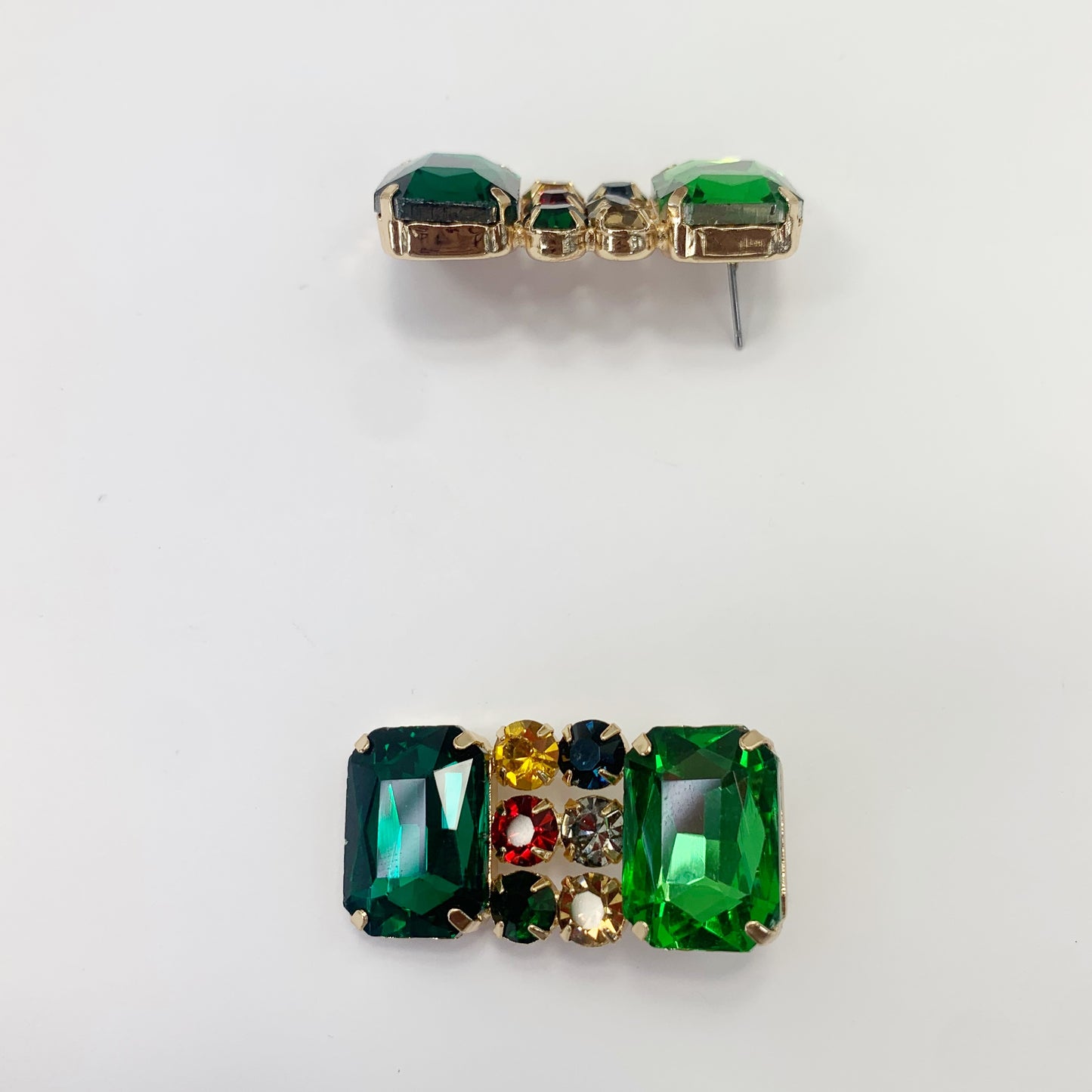 Rectangular crystal drop earrings with multicolor gemstone-inspired accents in a bold glamorous boutique style.
