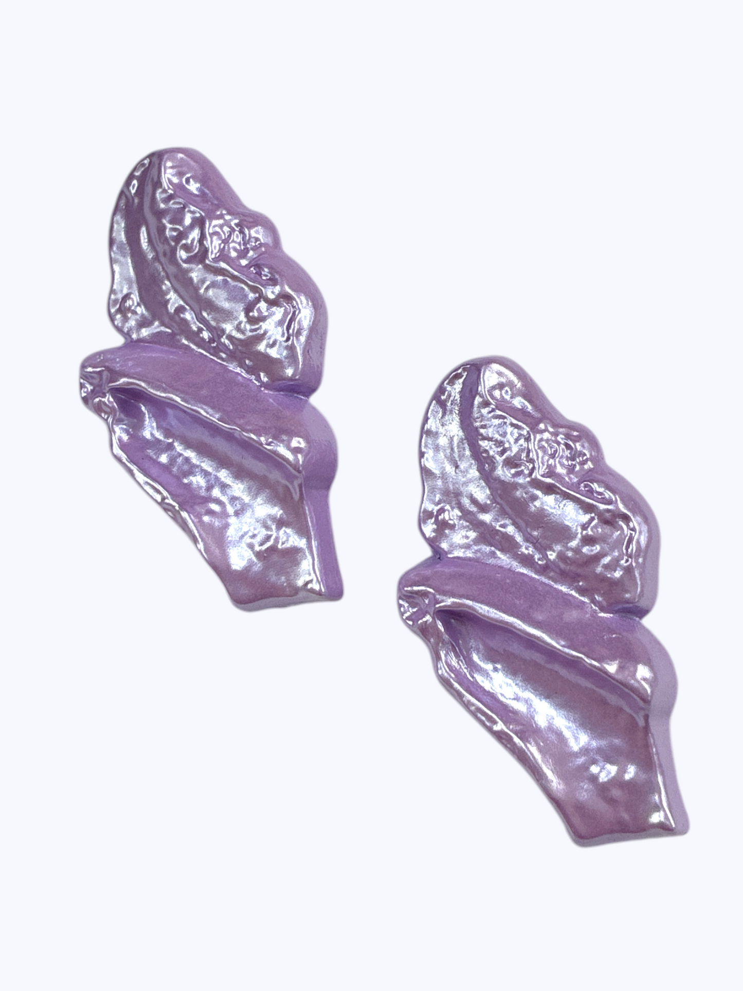 Glossy abstract statement earrings with sculpted lavender resin design for a chic artistic boutique style.