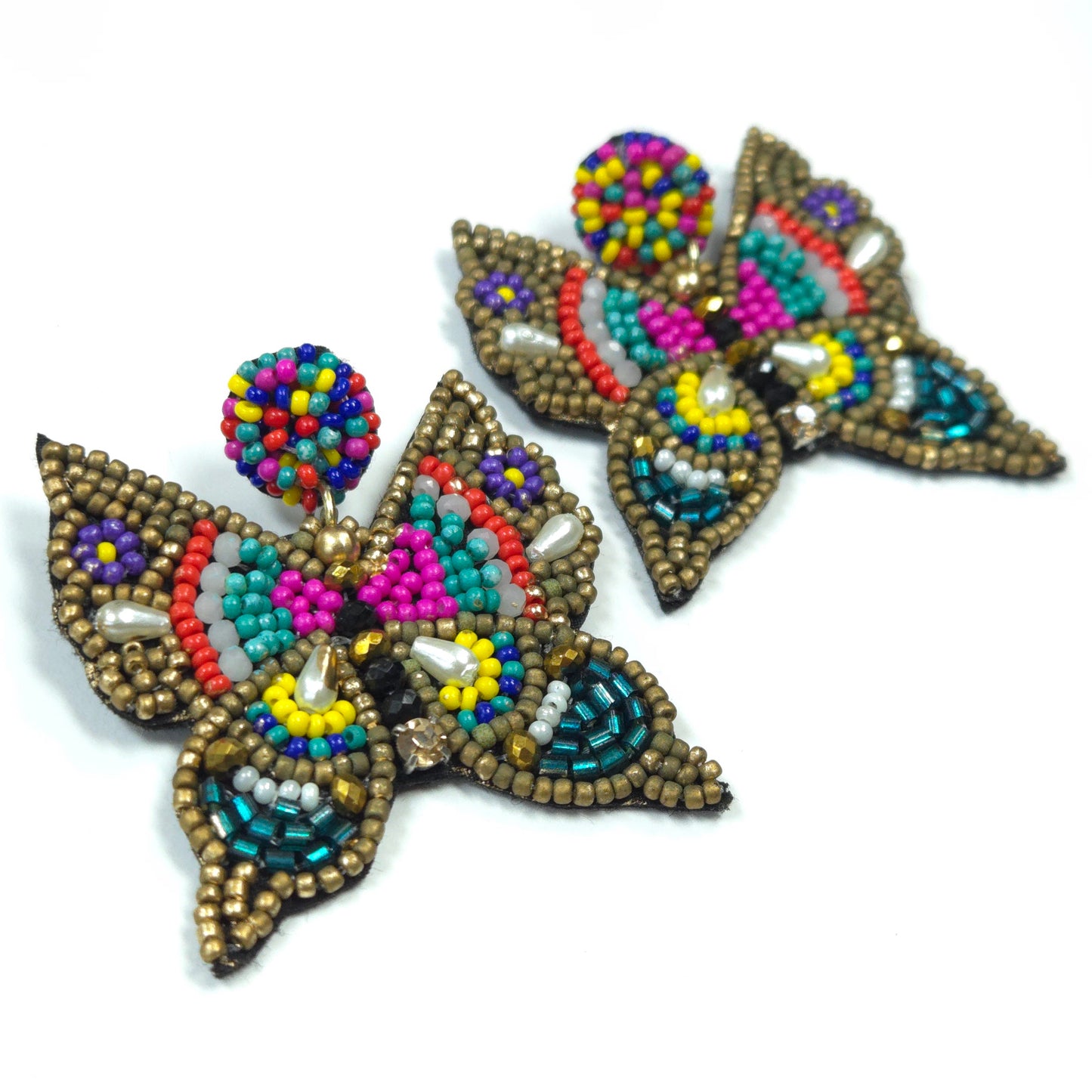 Two beaded butterfly decorations on a white background