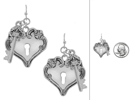 Silver heart-shaped key earrings on a white background