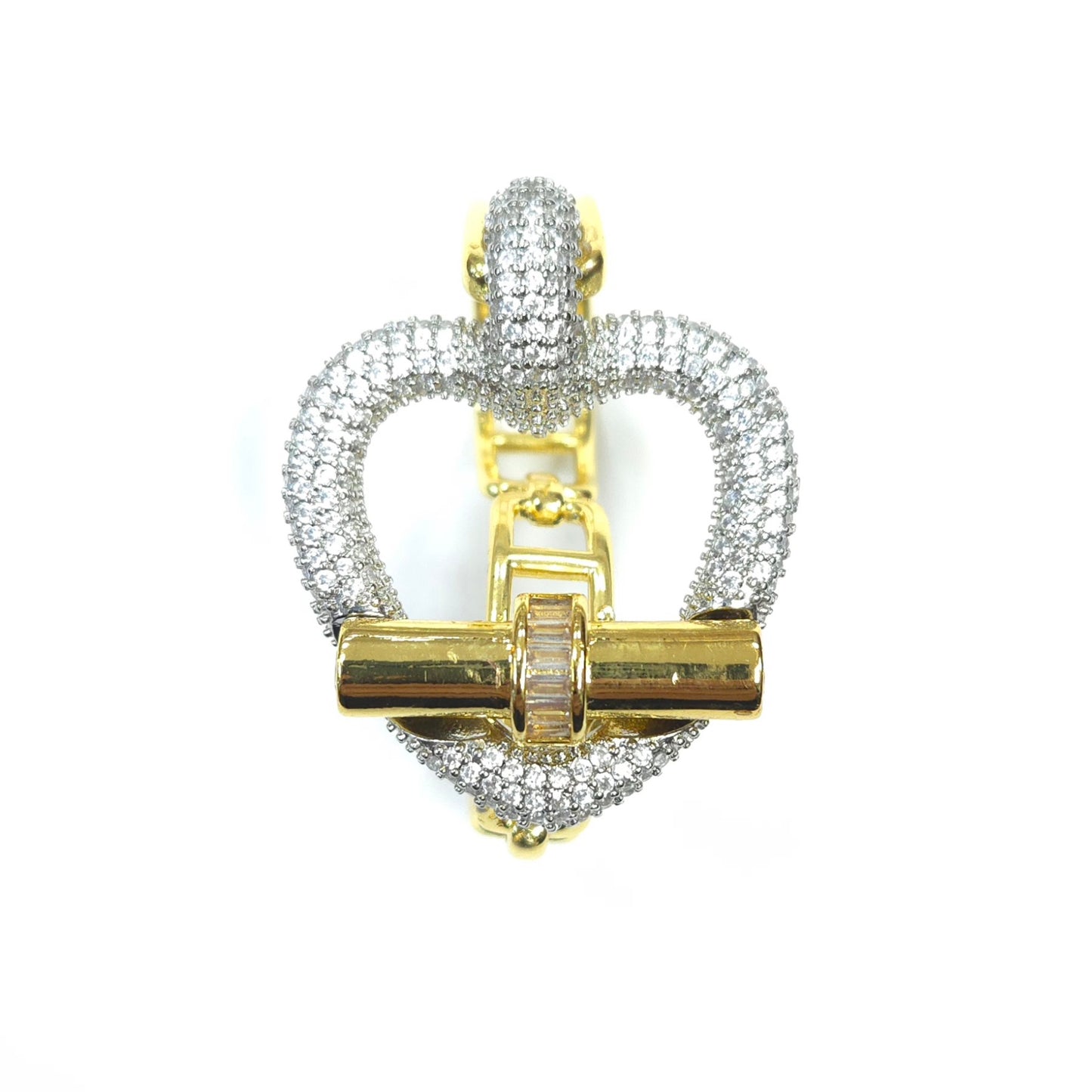 Gold and silver heart-shaped pendant on a white background