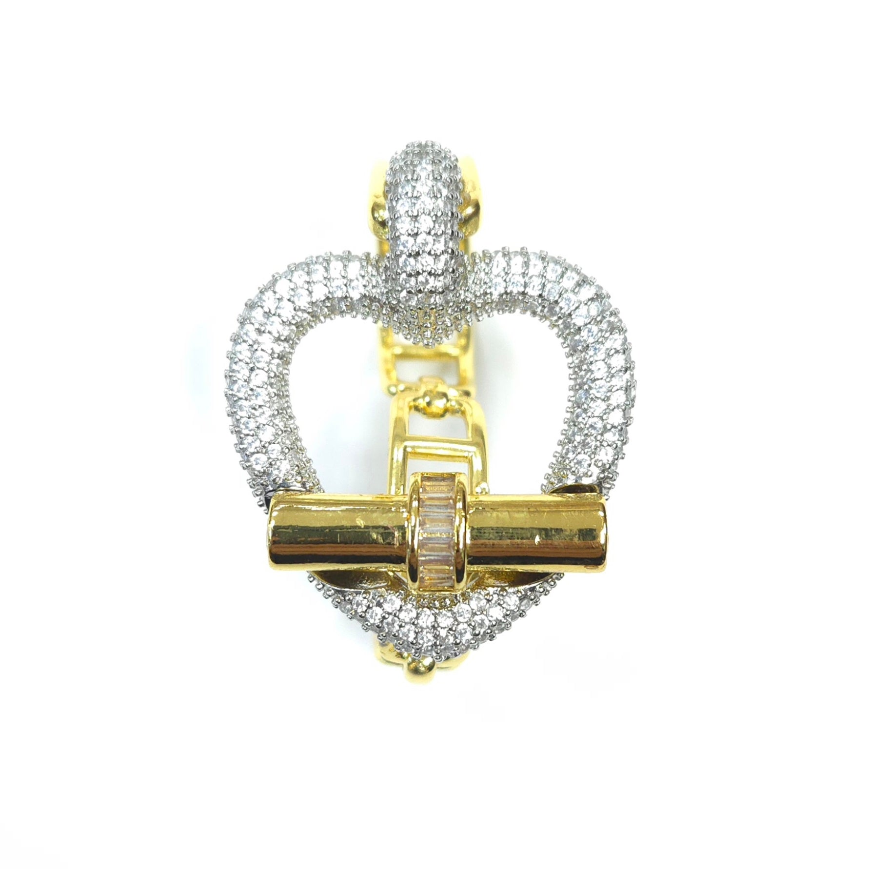 Gold and silver heart-shaped pendant on a white background