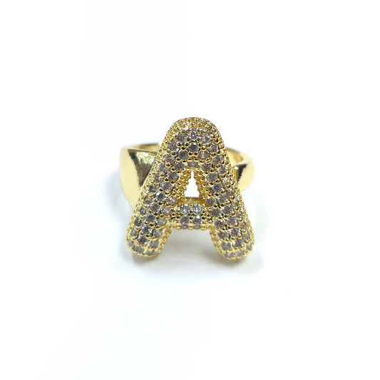 Gold ring with letter 'A' design on a white background