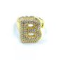 Gold ring with letter 'B' design on a white background